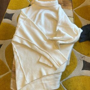 Free people oversized white turtleneck with fitted cuffs